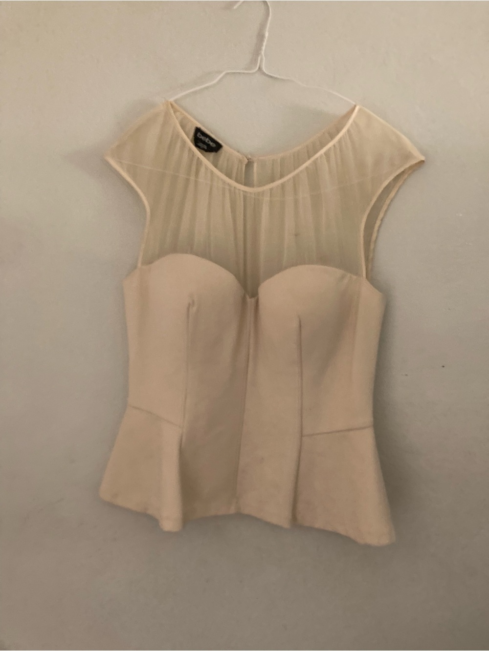 bebe Cream Peplum Illusion Neck Top